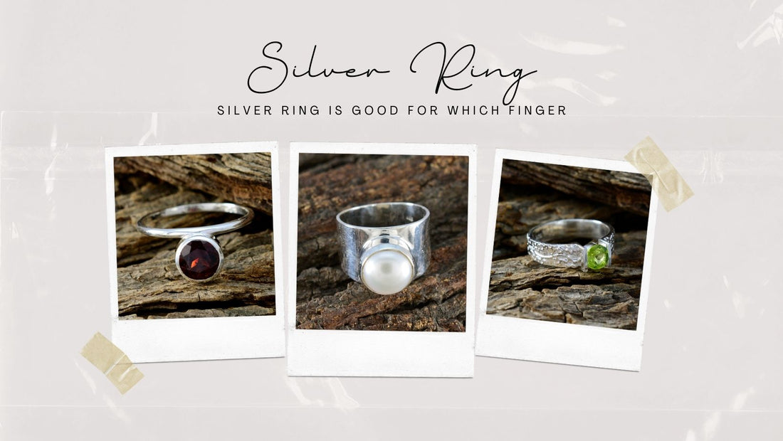 Collection of silver rings displayed on wood, highlighting which finger to wear silver ring on