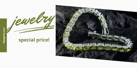 Elegant silver bracelet turning brown with sparkling green gemstones on a dark background