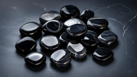 Collection of polished black onyx stones ideal for creating sterling silver black onyx jewelry