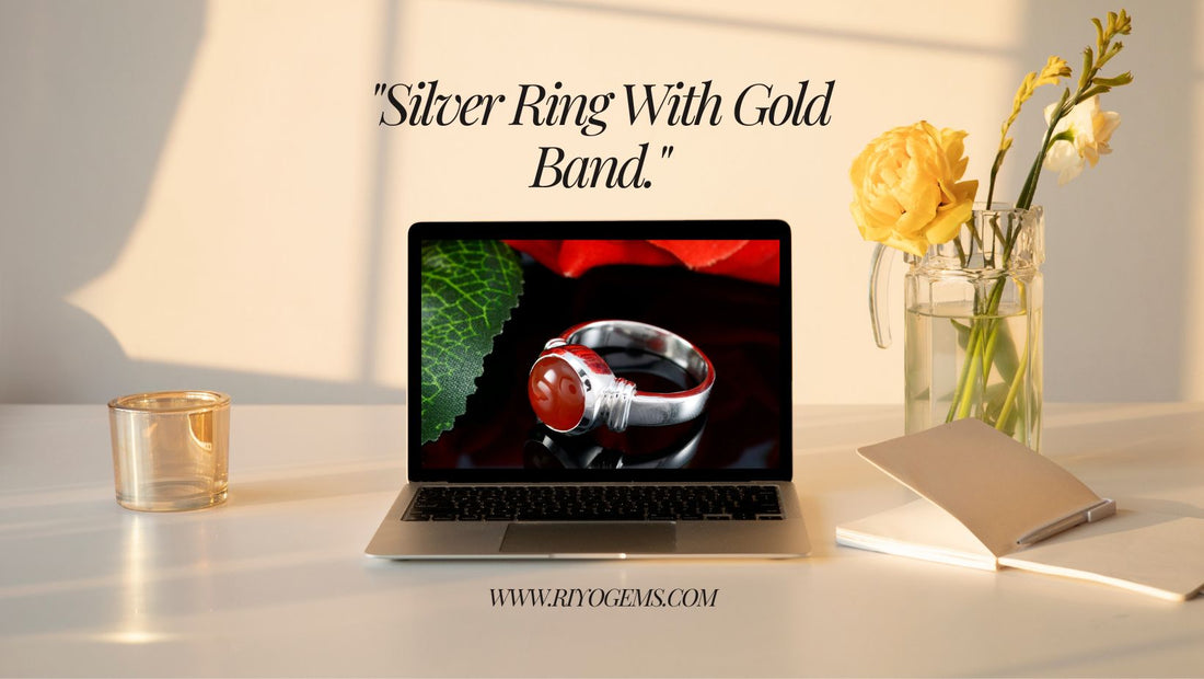 Luxurious silver ring with gold band, displayed elegantly on a laptop screen