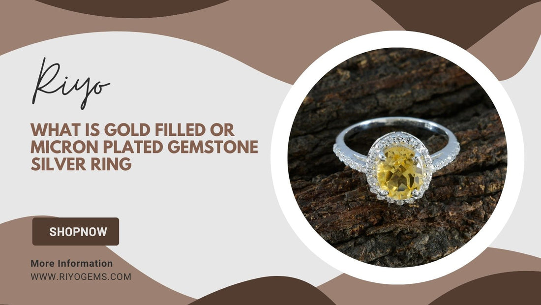 Gold filled or micron plated gemstone silver ring featuring a yellow stone on a rustic background
