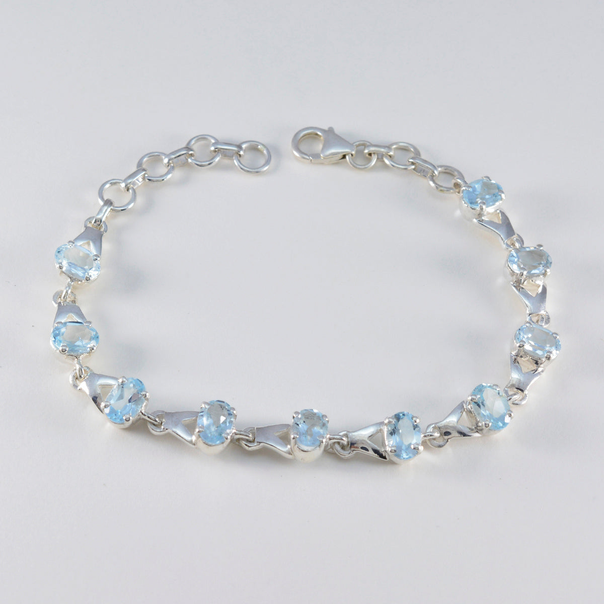 Pulsera fina de eslabones de plata de ley con topacio azul Diwali