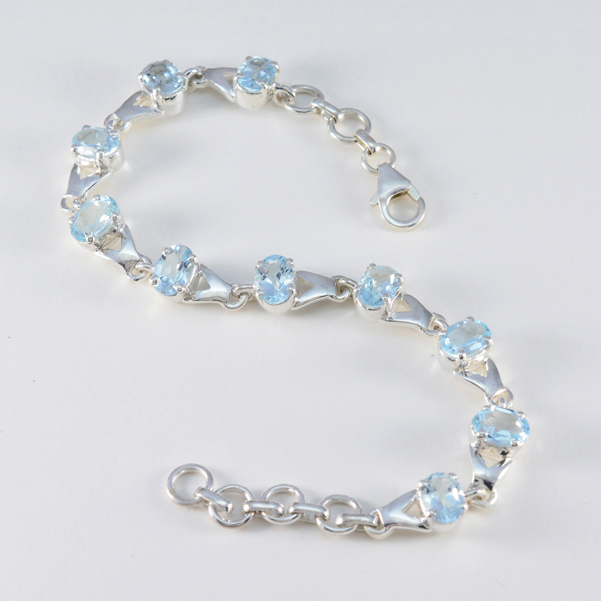 Pulsera fina de eslabones de plata de ley con topacio azul Diwali