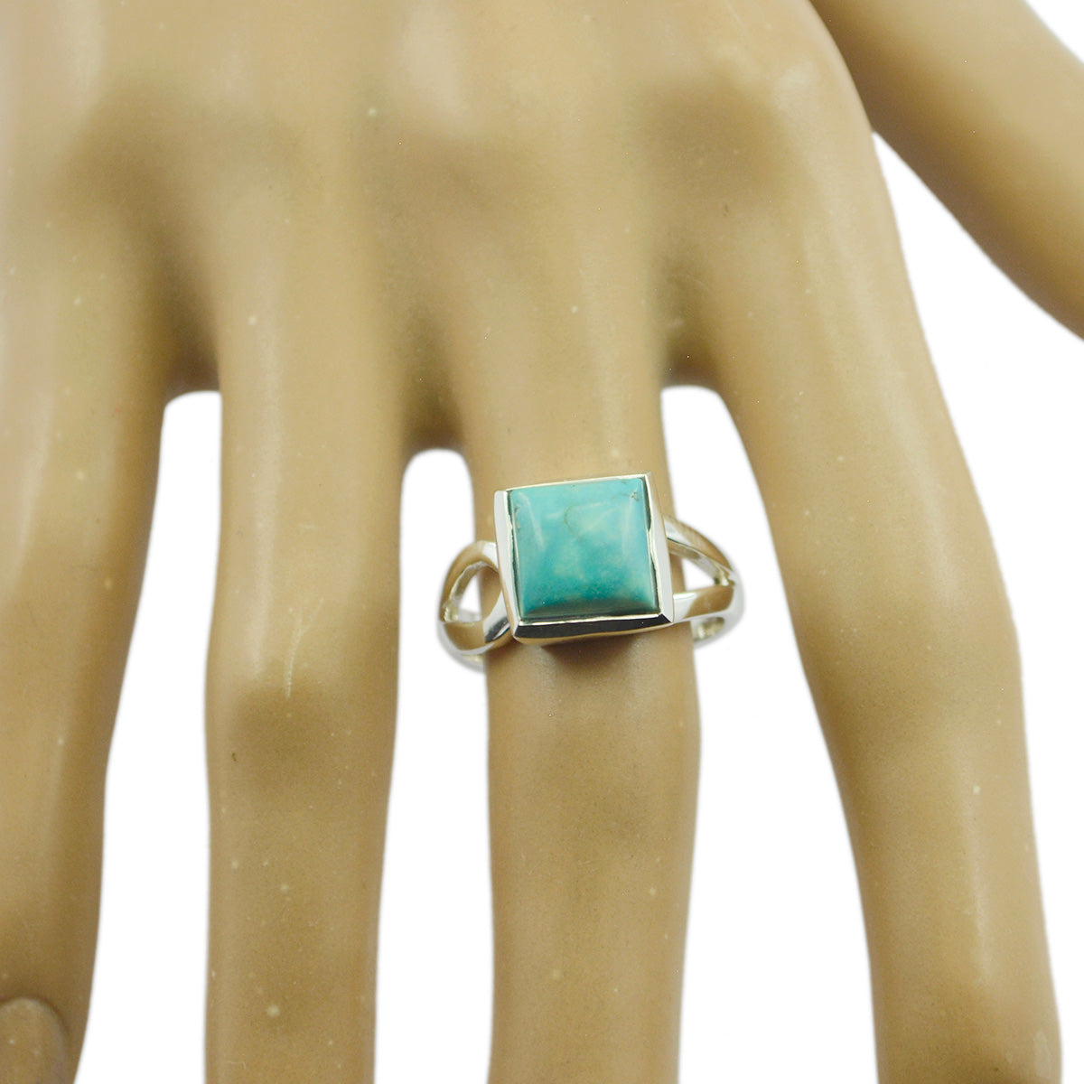 Anillo artesanal de peso medio con solitario turquesa en plata de ley 925 india y gemas azules. Imagen secundaria del producto