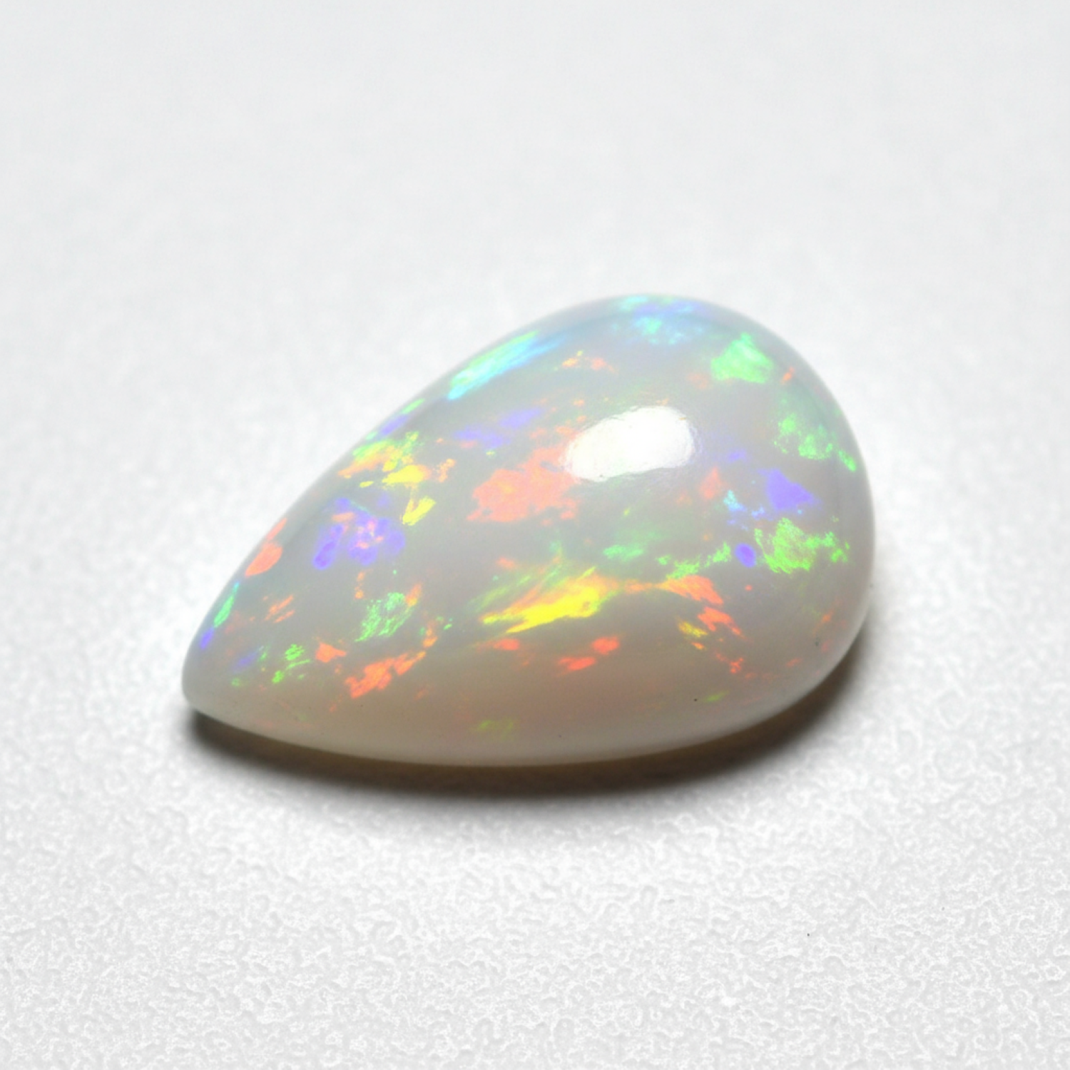 Created Opal 1PC Medium 8x10 MM Pear Cabochon White Lustrous semi Precious Loose Gemstone Imagen principal del producto