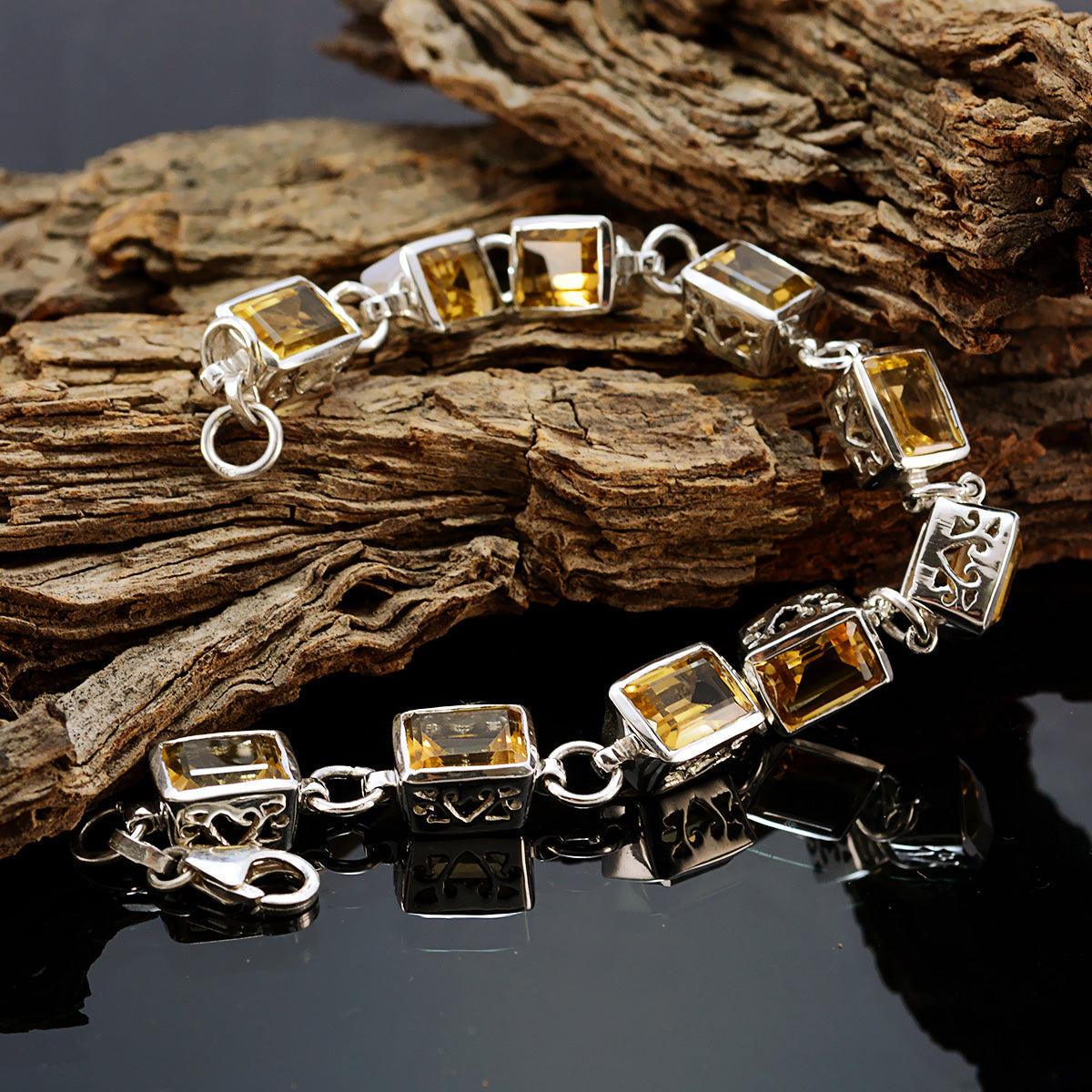 Citrine silver bracelet with rectangular citrine stones set in elegant silver metal links