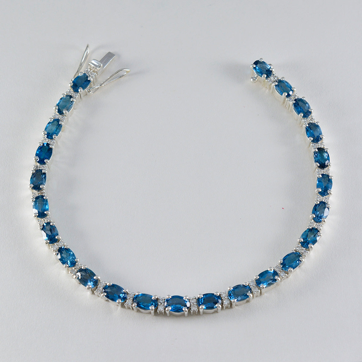 Riyo Attraktives 925er-Sterlingsilber-Armband für Damen, blaues Topas-Armband, Krappenfassung-Armband mit Box, mit Zungen-Tennis-Armband, Größe L, 15,2–21,6 cm.