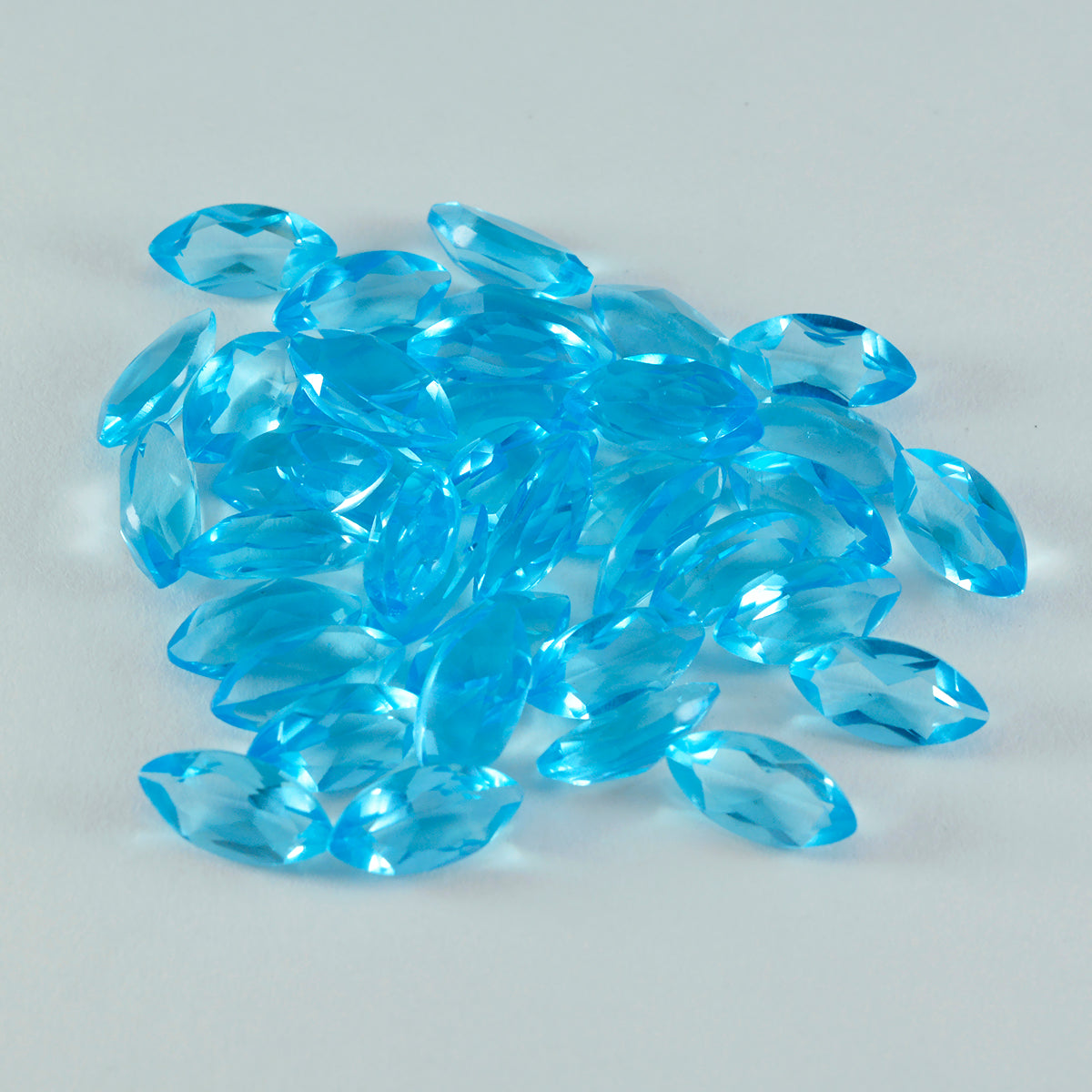 Riyogems 1 pieza de topacio azul CZ facetado 7x14 mm forma marquesa una piedra preciosa de calidad