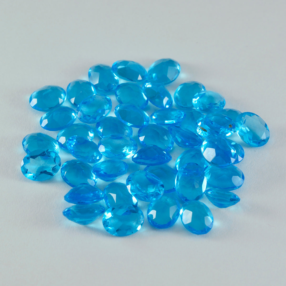 Riyogems 1 Stück blauer Topas, CZ, facettiert, 5 x 7 mm, ovale Form, Edelsteine von guter Qualität