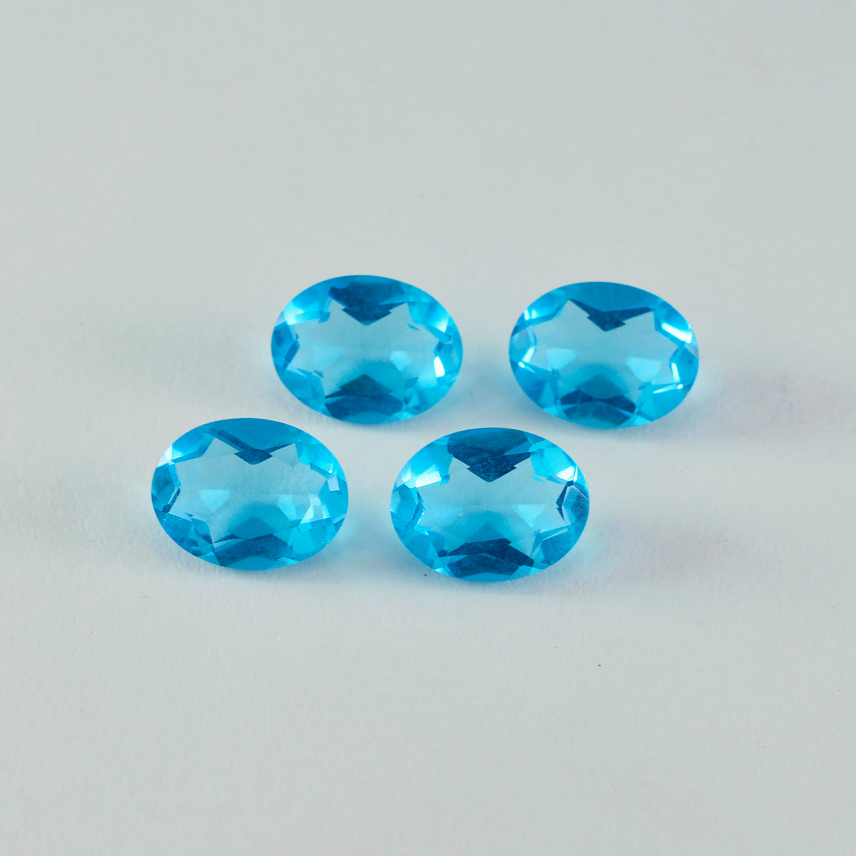 Riyogems 1pc topaze bleue cz facettes 9x11mm forme ovale jolie qualité pierres précieuses en vrac