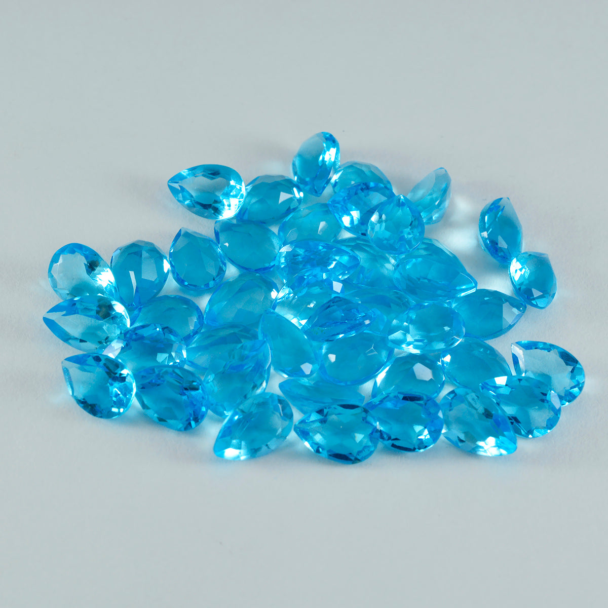 Riyogems 1 pieza de topacio azul CZ facetado 5x7 mm forma de pera piedra preciosa de calidad asombrosa