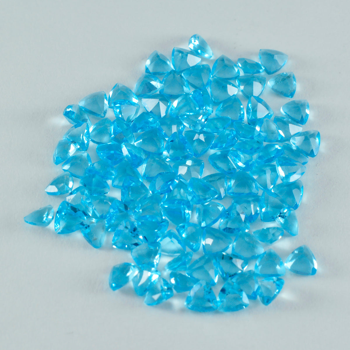 Riyogems 1PC Blue Topaz CZ Faceted 4x4 mm Trillion Shape great Quality Gemstone