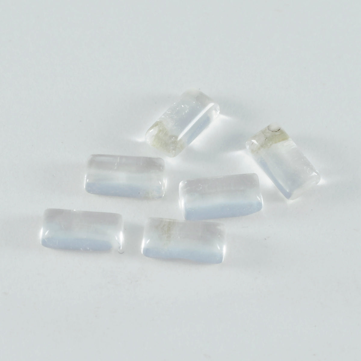 Riyogems 1 Stück weißer Kristallquarz-Cabochon, 5 x 10 mm, Baguett-Form, A+1-Qualität, loser Stein