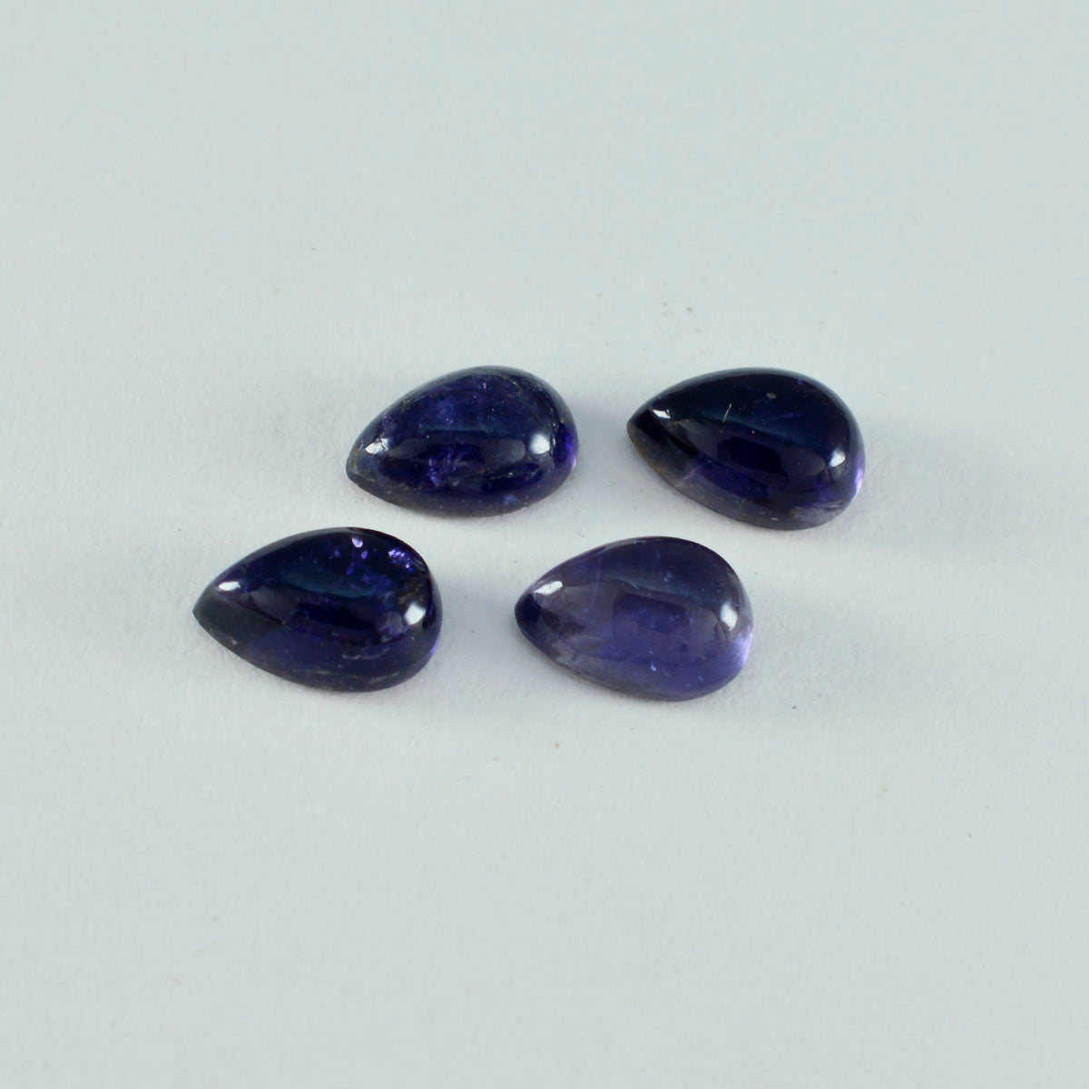 riyogems 1 st blå iolit cabochon 6x9 mm päronform söt kvalitetsädelsten