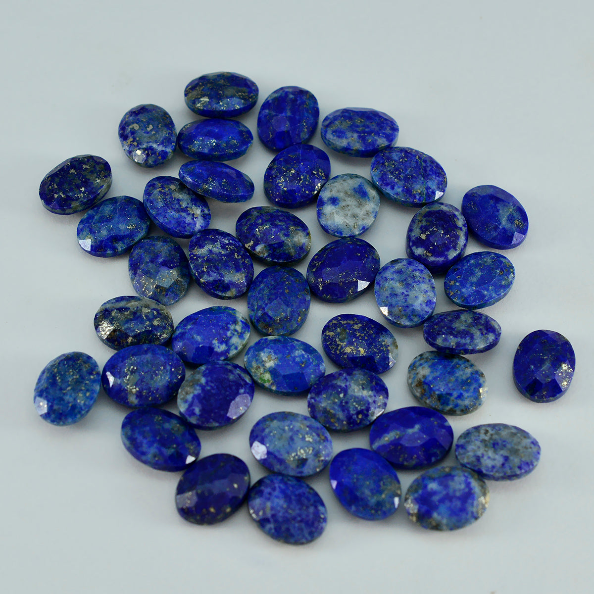 Riyogems 1 Stück echter blauer Lapislazuli, facettiert, 7 x 9 mm, ovale Form, schöner Qualitäts-Edelstein