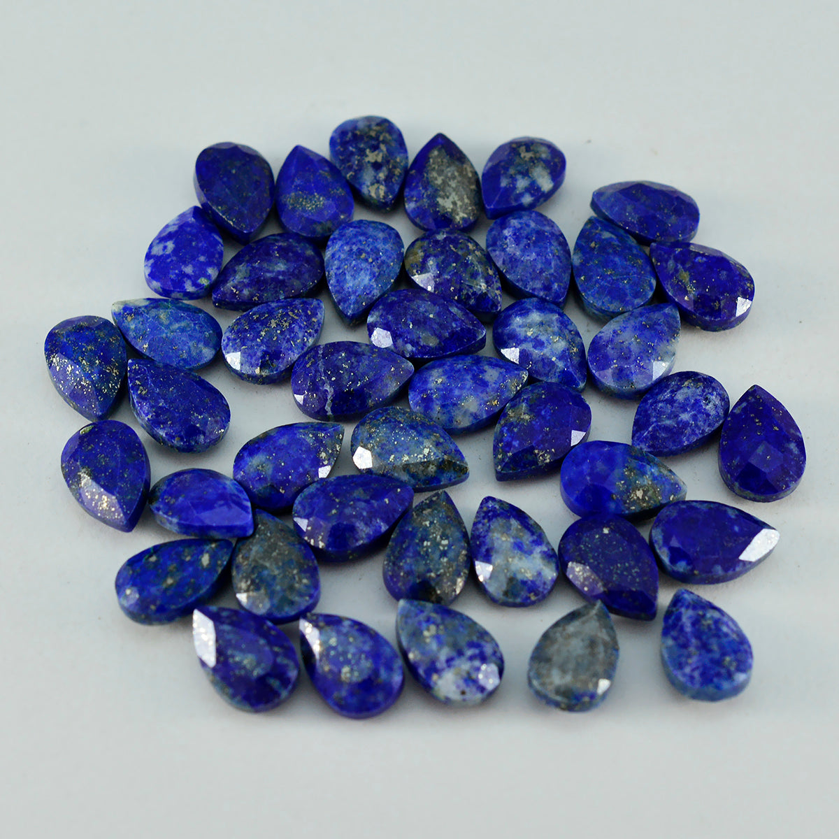 riyogems 1 st äkta blå lapis lazuli facetterad 5x7 mm päronform häpnadsväckande kvalitet ädelsten