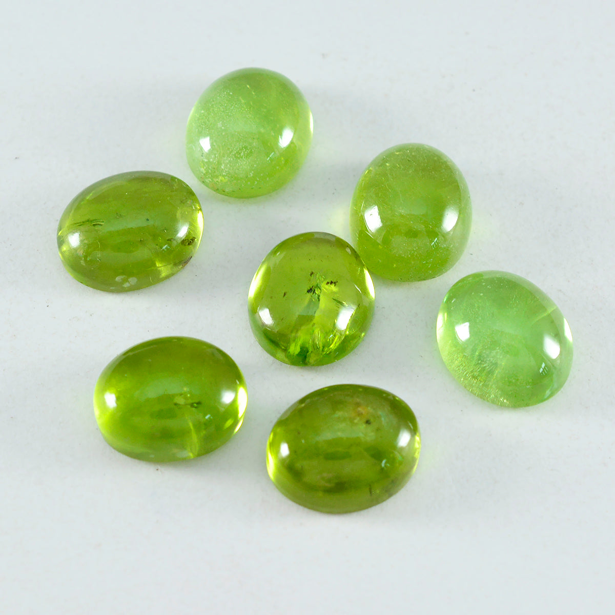 riyogems 1 st grön peridot cabochon 10x14 mm oval form underbar kvalitetssten