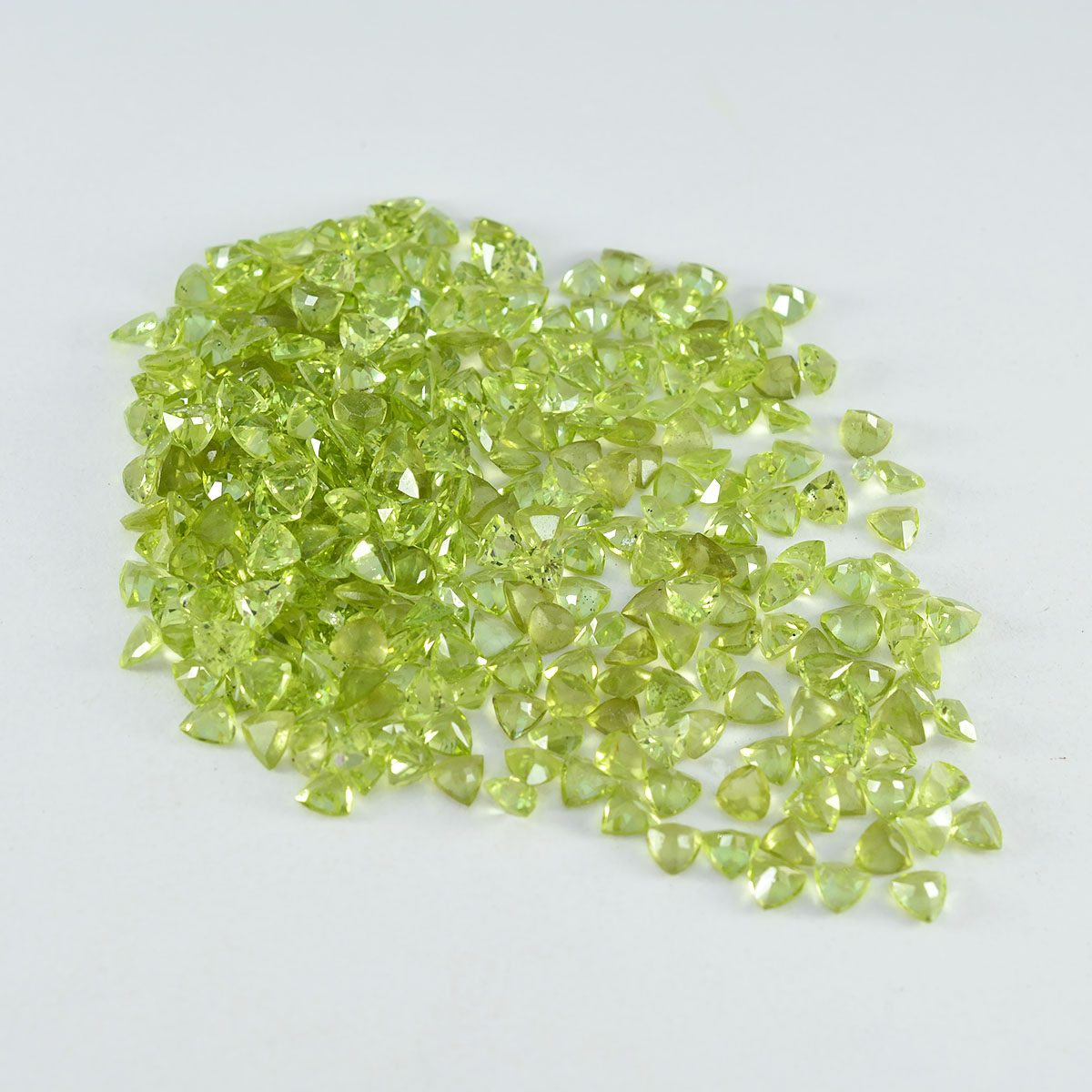 riyogems 1pc natural green peridot faceted 4x4 mm trillion shape superb quality stone